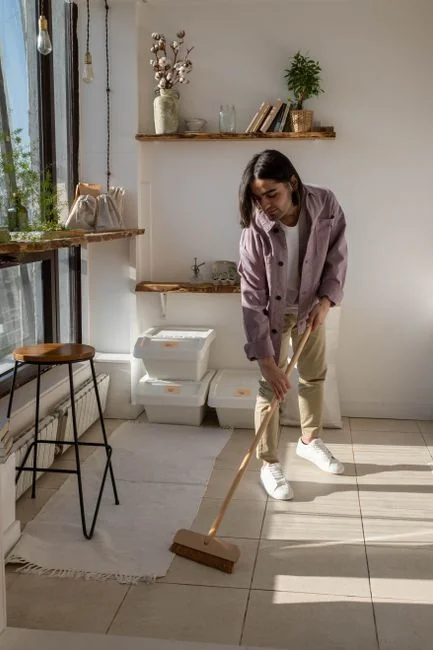 Colleagues interact in a modern office setting, blending technology with workplace hygiene.